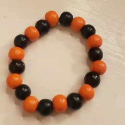 Bracelet with orange and black beads